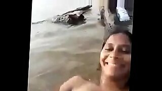 indian aunty sitting for toilet out side